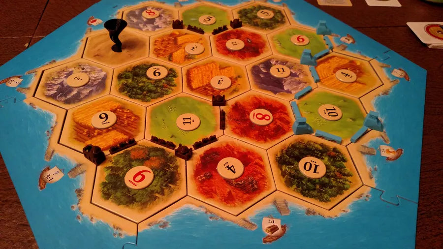 Catan: The Helpers - Cats In Hat Inc.