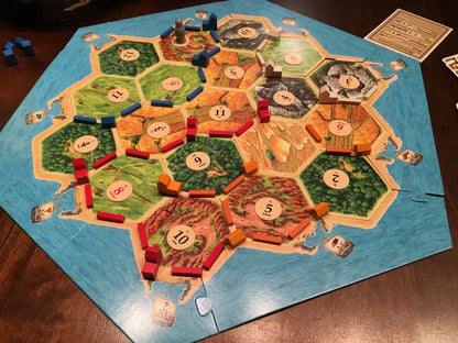 Catan: The Helpers - Cats In Hat Inc.