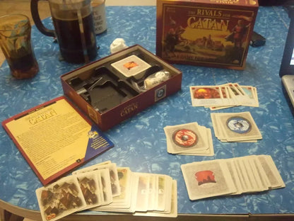 Rivals For Catan - Cats In Hat Inc.